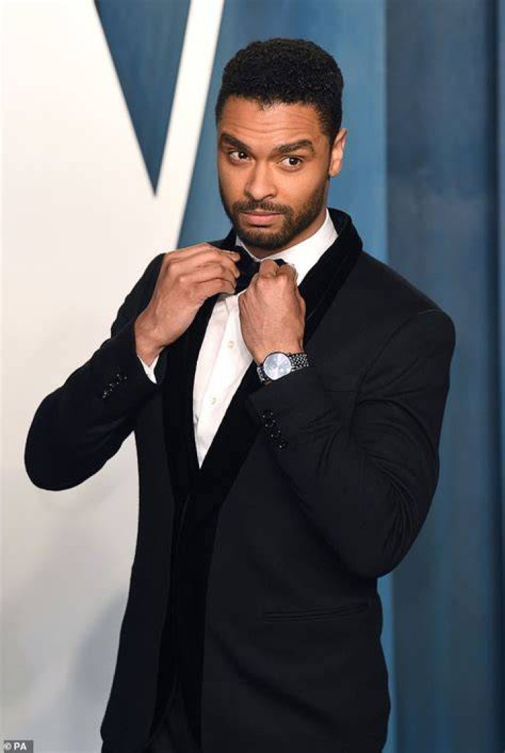 Handsome:&nbsp;Rege-Jean Page looked typically handsome as he arrived, wearing a bright pink shirt underneath a black jacket and fitted black trousers